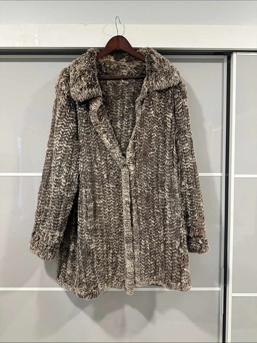 Woven chinchilla grey Women's sweater.  Price is firm.